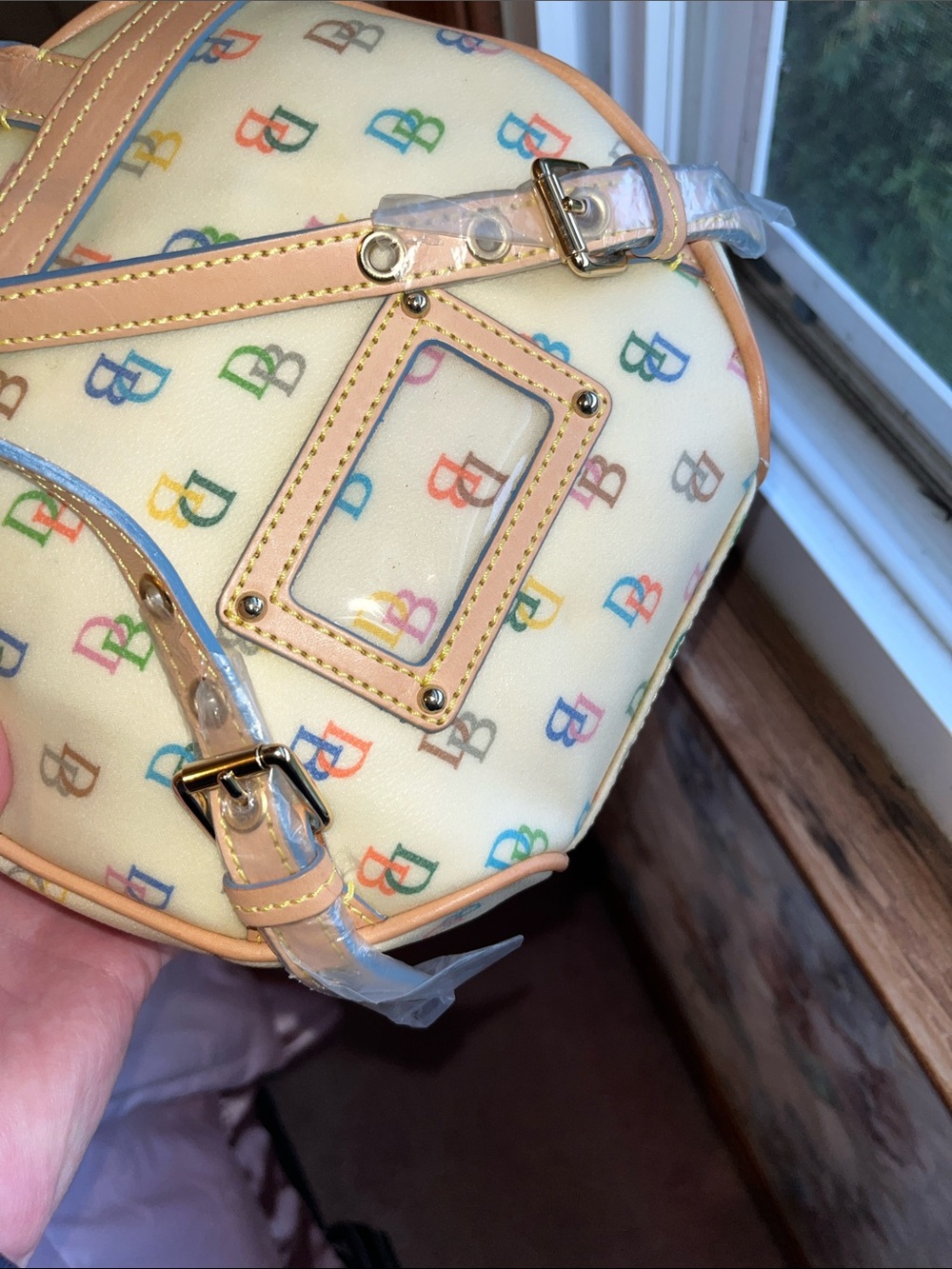 NWT Dooney & Bourke Cream Multicolor Logo Coated Canvas Backpack with Tan Trim - Picture 12 of 14